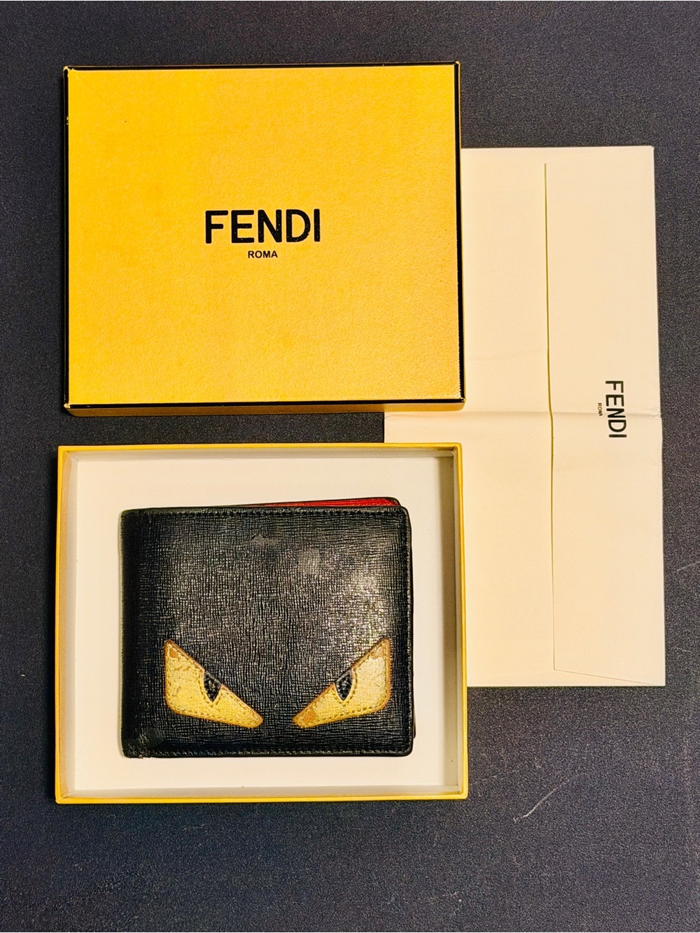 USED / Fendi Men's Leather Bi-fold Monster Wallet - Black & Yellow, Red Interior